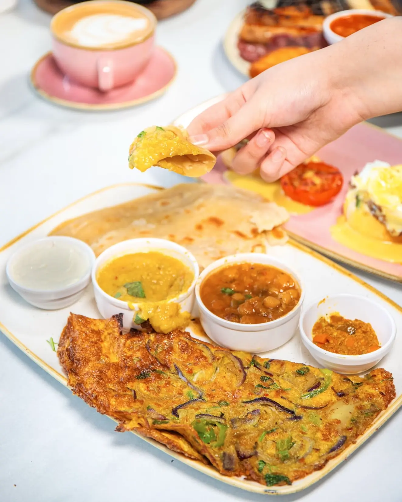 Desi breakfast with eggs and sides